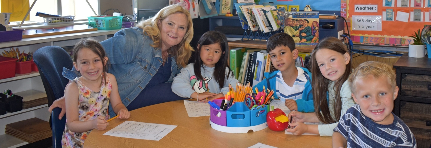 Kindergarten teacher and students