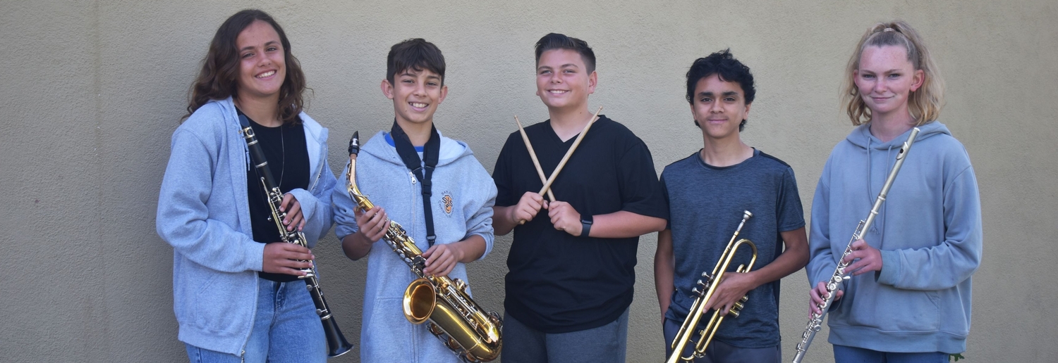 students with band instruments